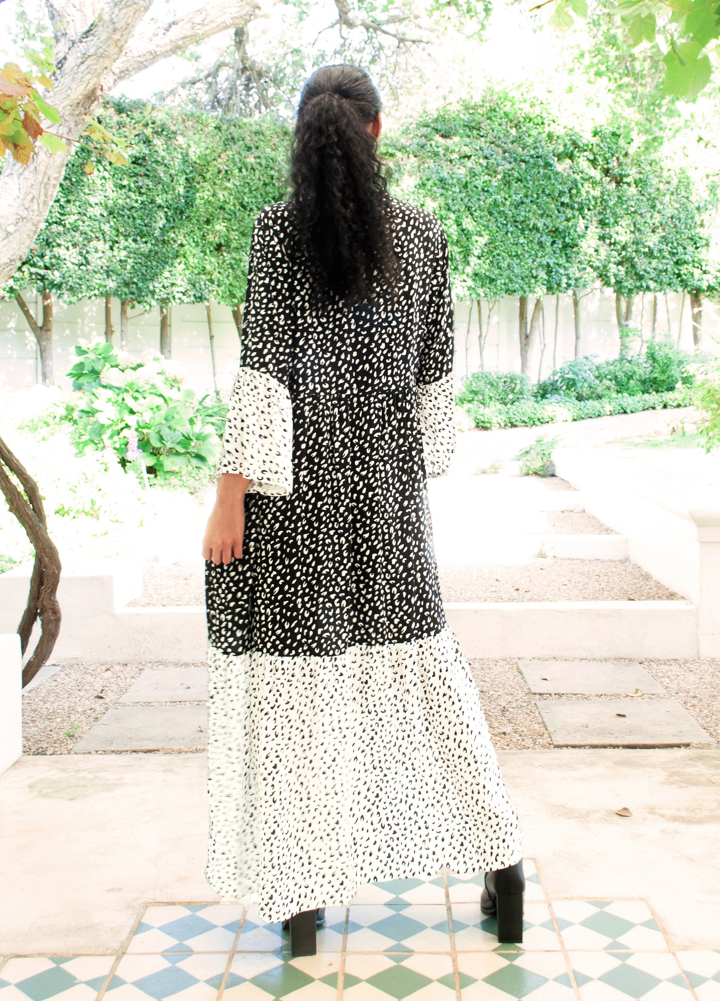 Cora maxi tiered dress in black Spot Leopard print