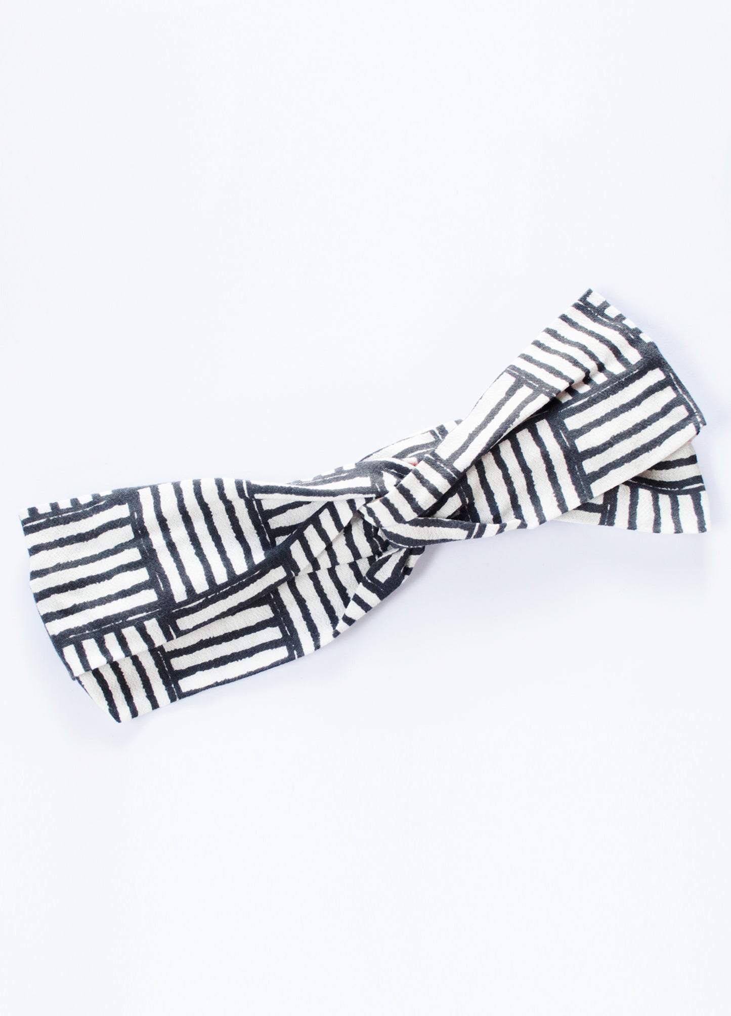 Emma twist headband in white Stripe Blocks print