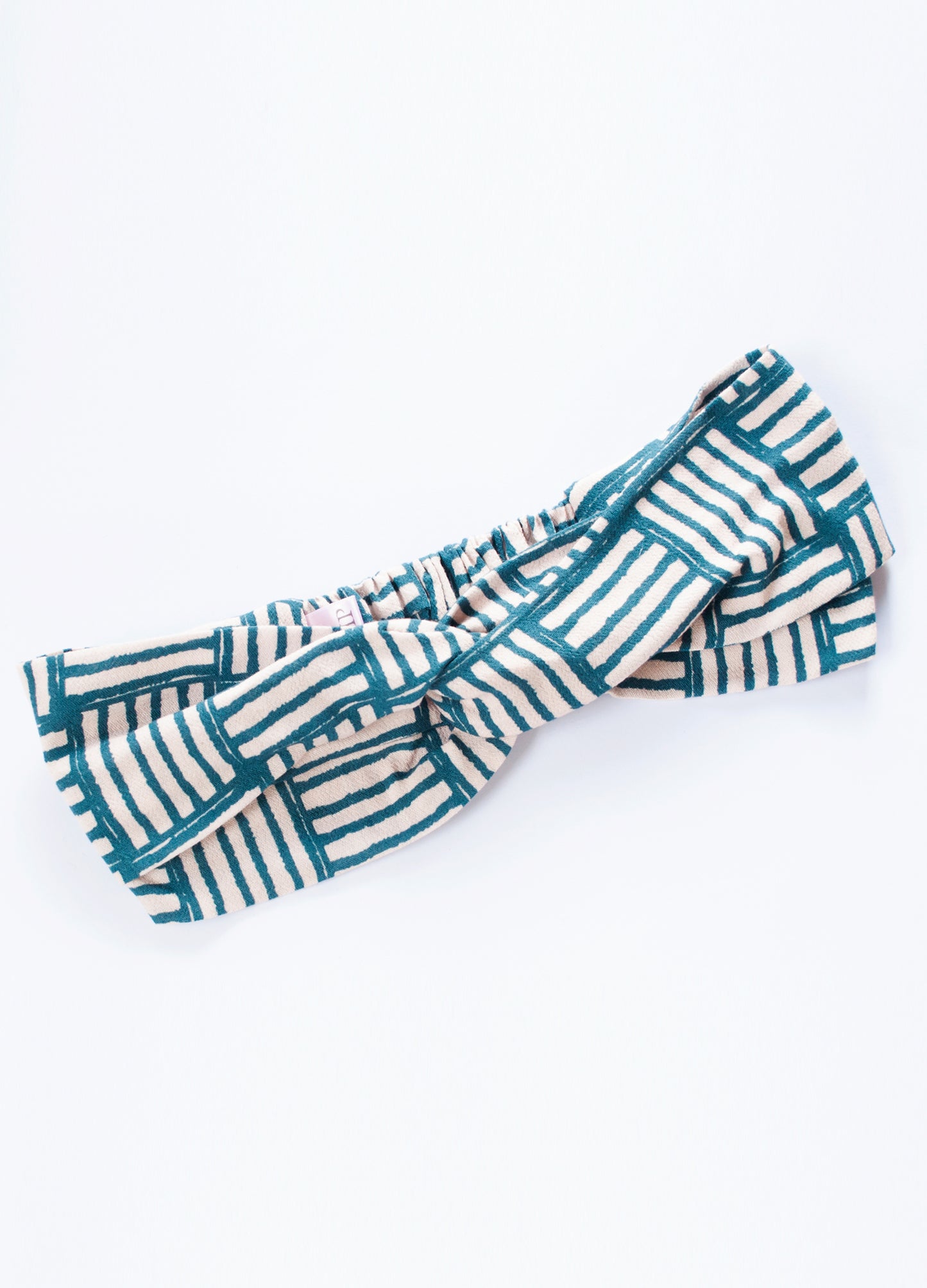 Emma twist headband in cyprus Stripe Blocks print
