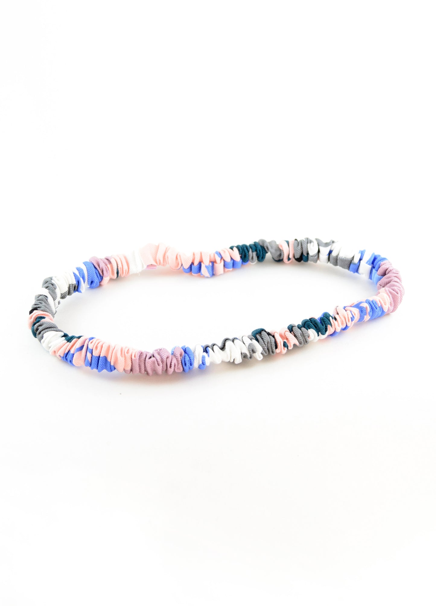 Fifi elasticated headband in blush Sunset Leaves