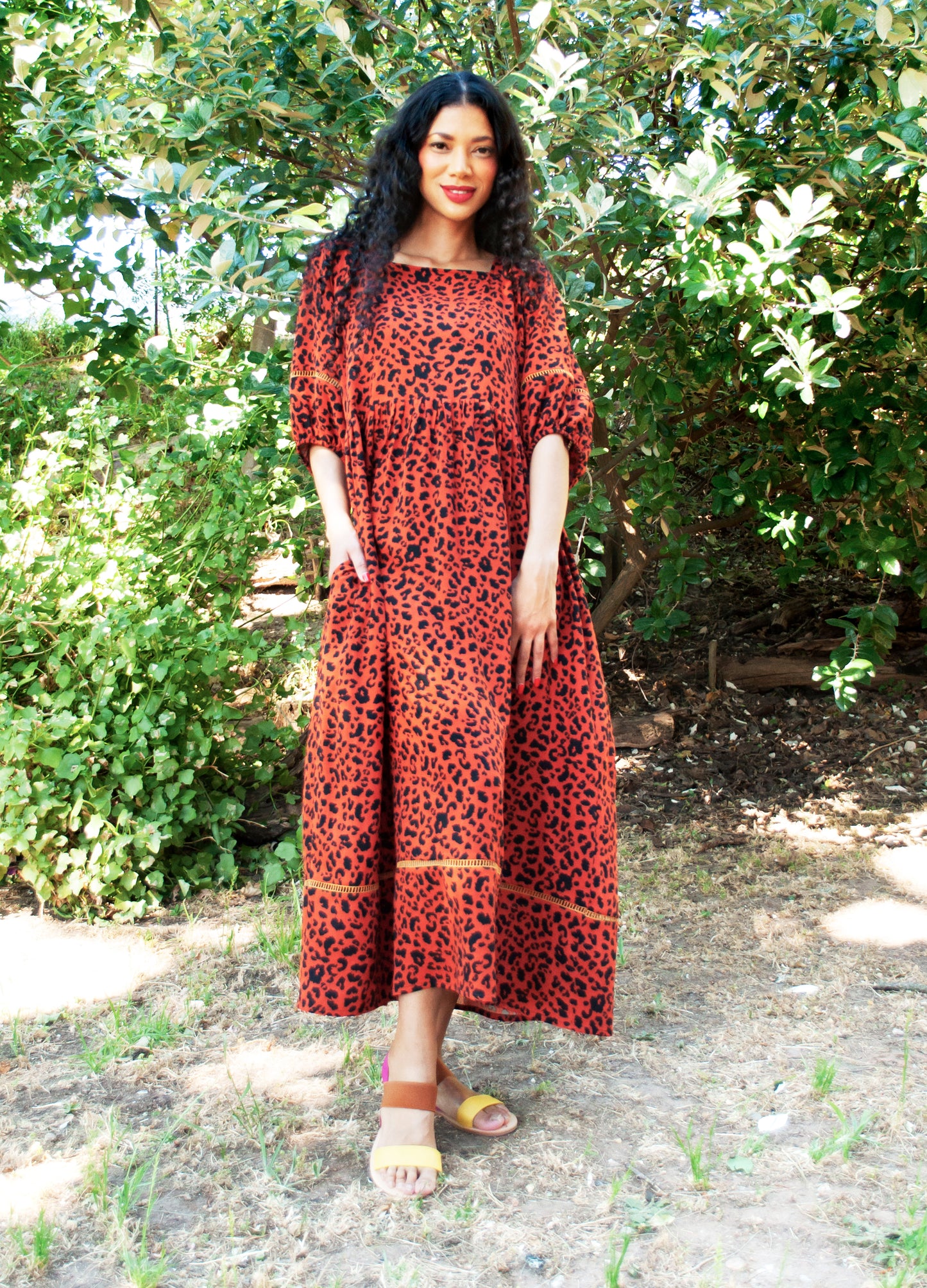 Luna reversabile dress in rust Out of Africa print