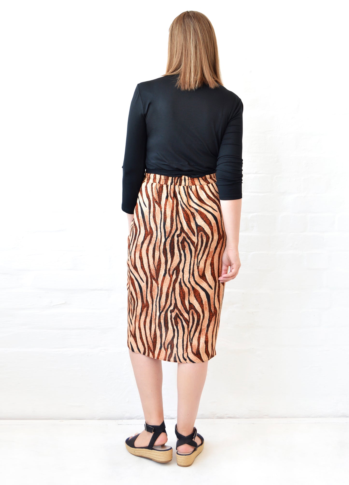 Willow wrap skirt in caramel Tiger Wave print