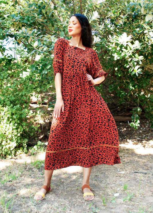 Luna reversabile dress in rust Out of Africa print