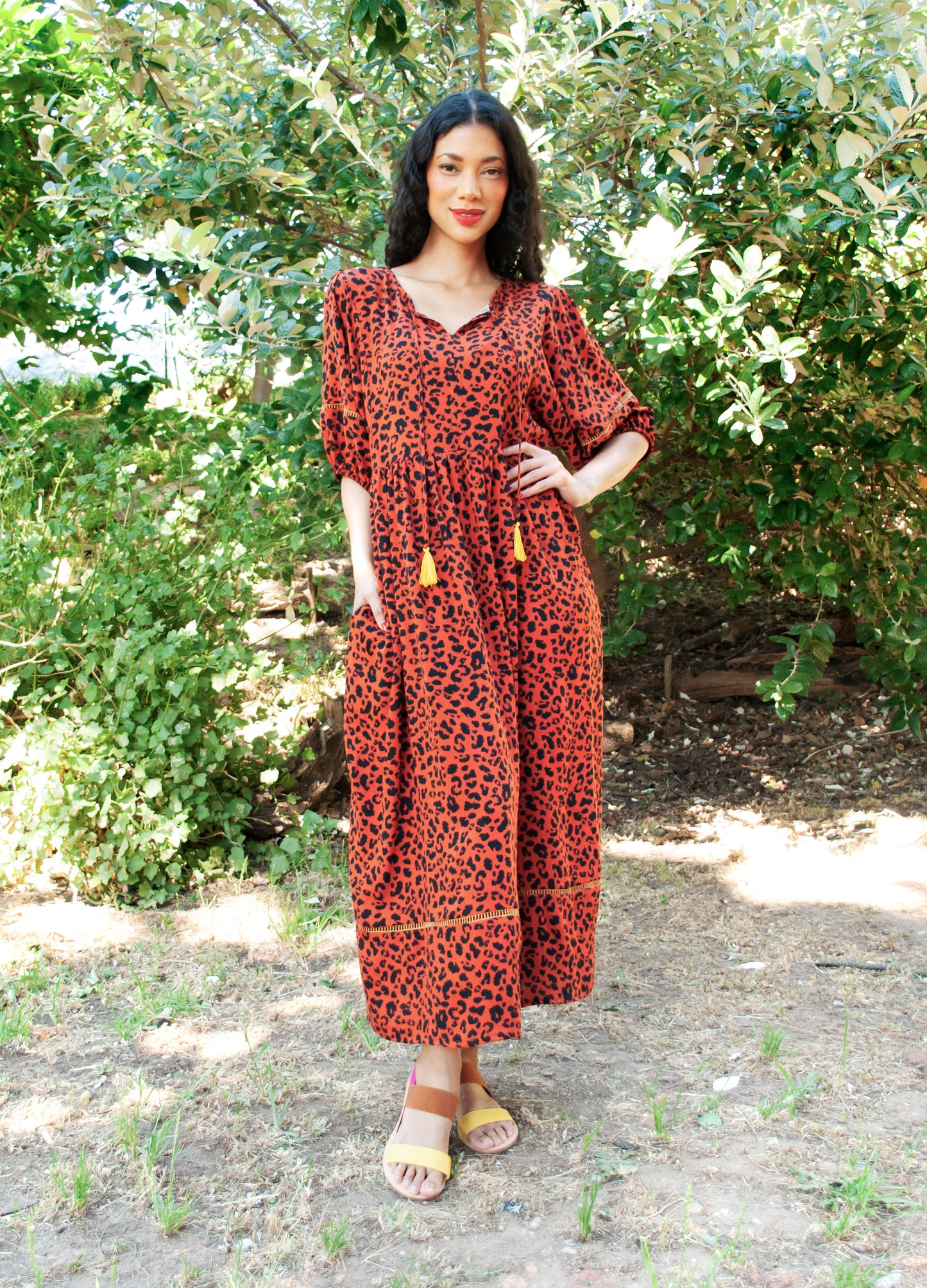 Luna reversabile dress in rust Out of Africa print