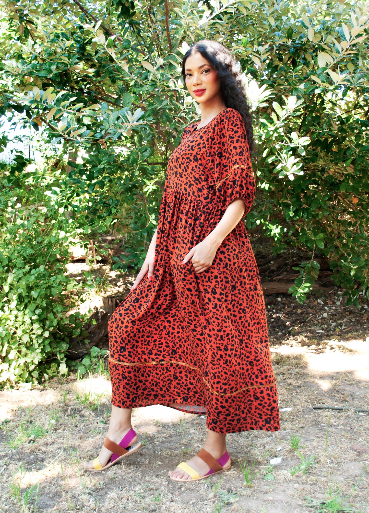 Luna reversabile dress in rust Out of Africa print