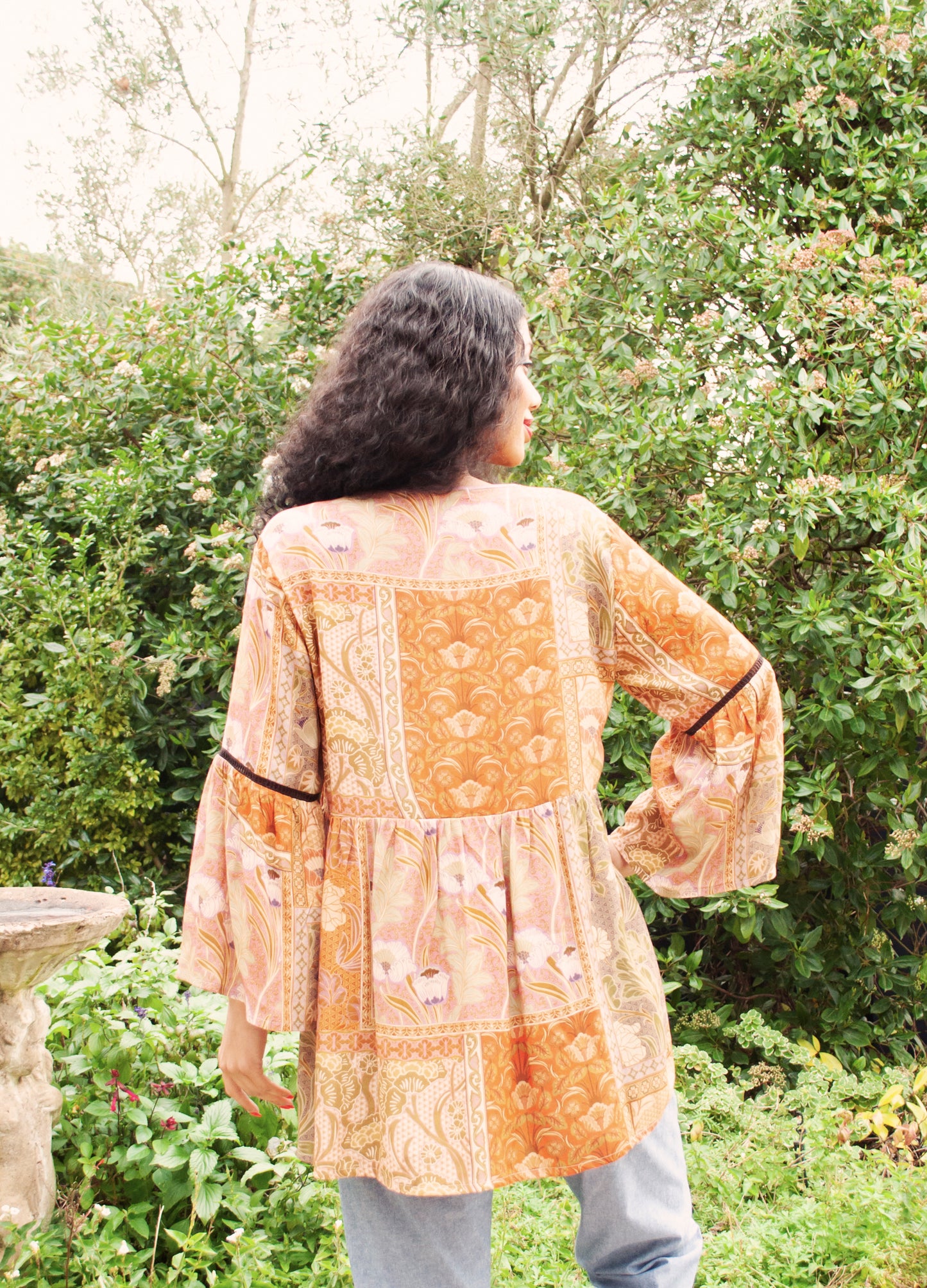 Sylvie blouse in rust Plumeria print