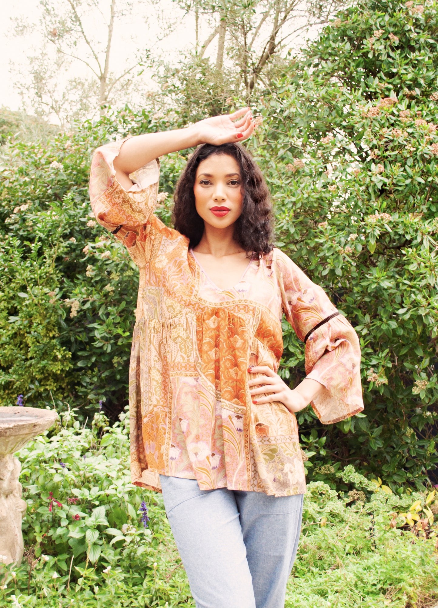 Sylvie blouse in rust Plumeria print