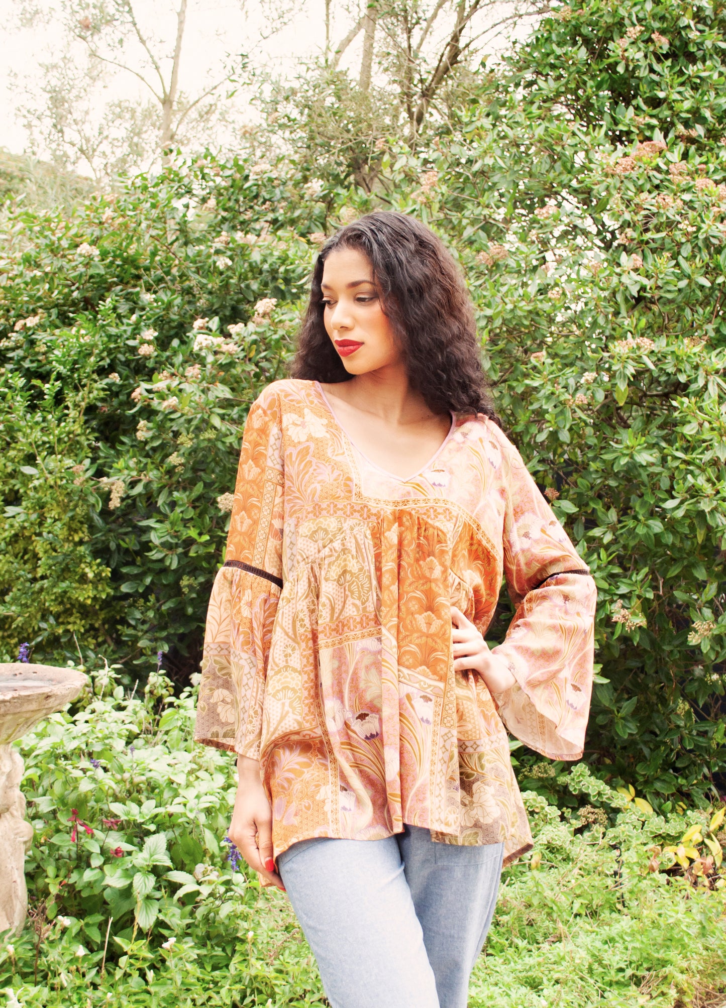 Sylvie blouse in rust Plumeria print