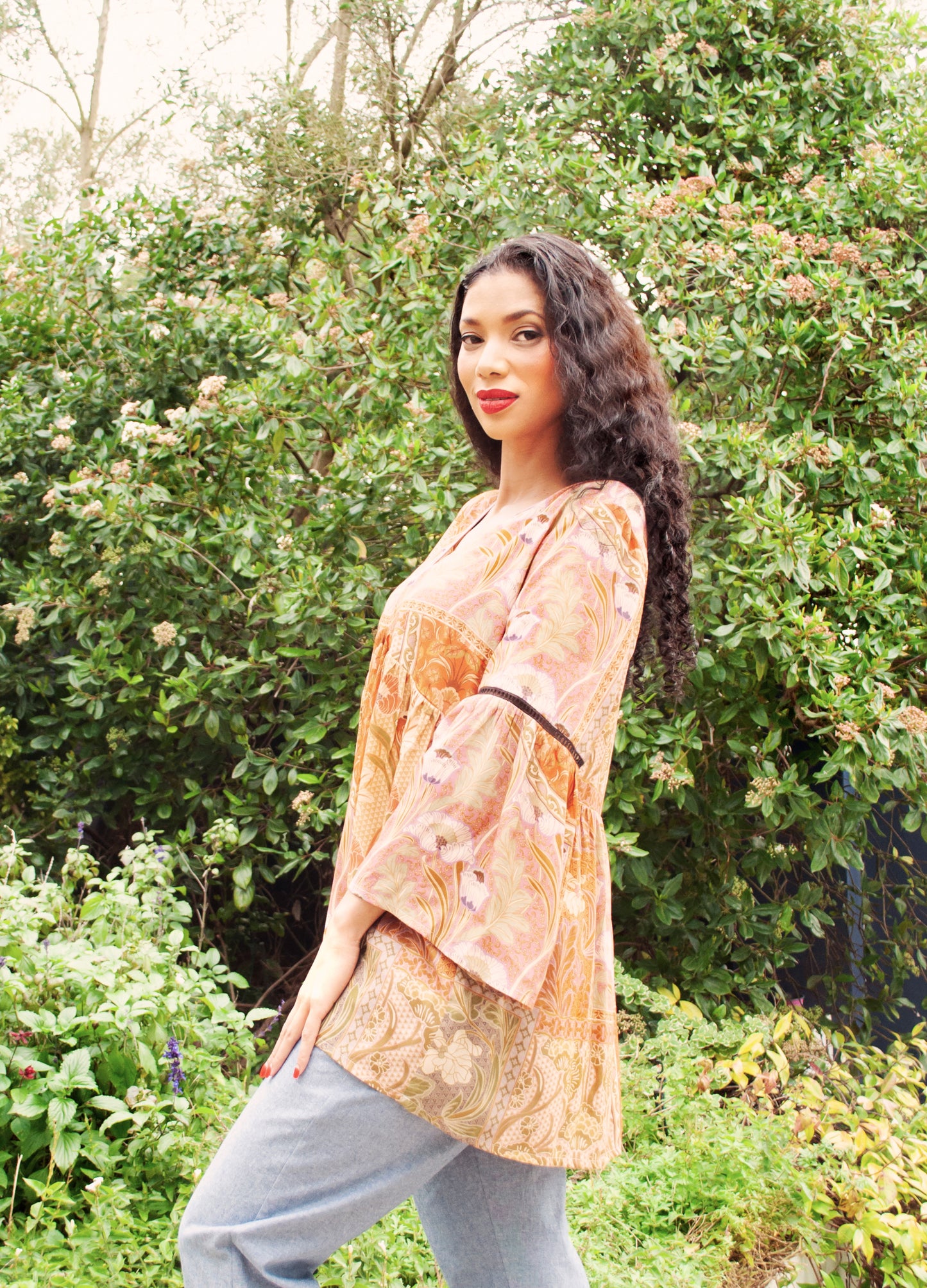 Sylvie blouse in rust Plumeria print